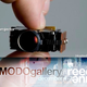 Illustration for article titled At Gizmodo Gallery: Tiny Projectors That Fit In Your Hand Or Mouth!